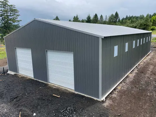 Long gray metal shop with windows
