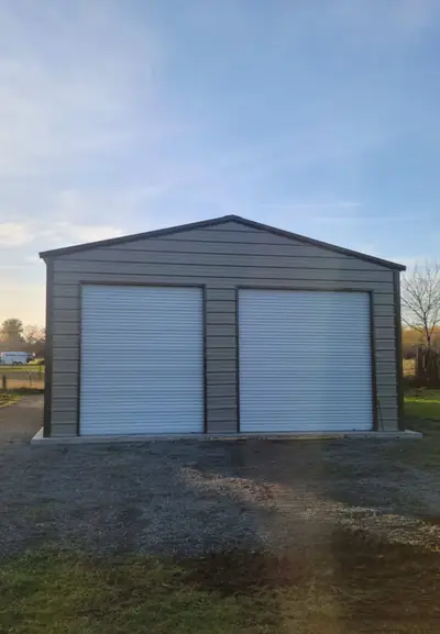 A-frame metal building with chain-driven doors