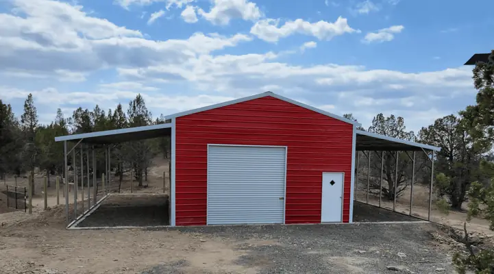 Red metal building with two lean-tos
