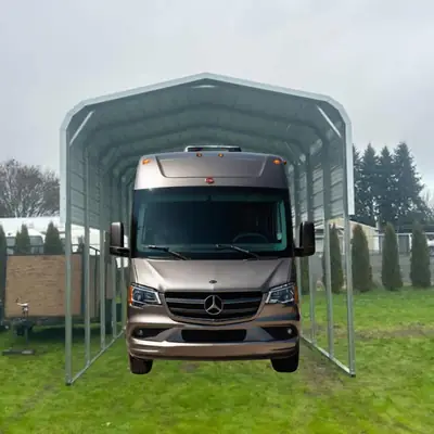 Class B motorhome under a round-roof RV cover