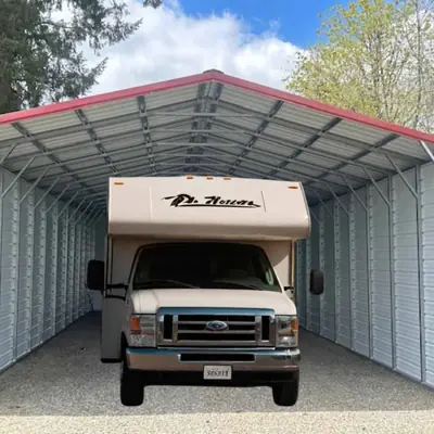 Motorhome parked under a metal RV cover