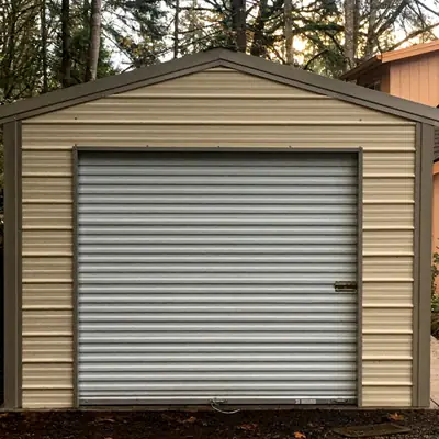 Tan enclosed garage with roll-up door
